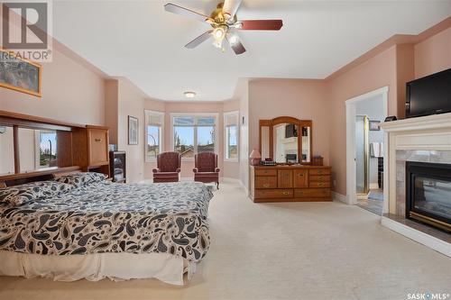 621 Brookhurst Court, Saskatoon, SK - Indoor Photo Showing Bedroom With Fireplace