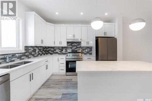 629 Feheregyhazi Boulevard, Saskatoon, SK - Indoor Photo Showing Kitchen With Double Sink With Upgraded Kitchen