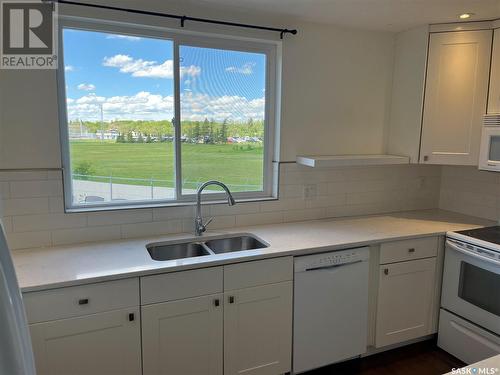 5010 10Th Avenue, Regina, SK - Indoor Photo Showing Kitchen With Double Sink