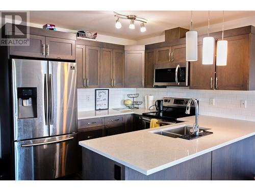 302 6798 Westgate Avenue, Prince George, BC - Indoor Photo Showing Kitchen With Double Sink With Upgraded Kitchen