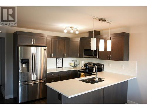 302 6798 Westgate Avenue, Prince George, BC - Indoor Photo Showing Kitchen With Double Sink