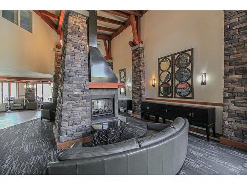 219 - 400 Stemwinder Drive, Kimberley, BC - Indoor Photo Showing Other Room With Fireplace