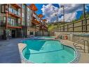 400 Stemwinder Drive Unit# 219, Kimberley, BC  - Outdoor With In Ground Pool 