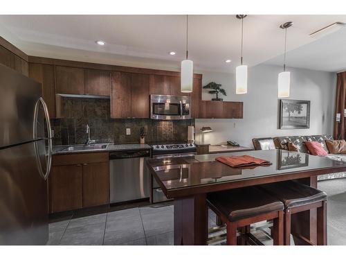 219 - 400 Stemwinder Drive, Kimberley, BC - Indoor Photo Showing Kitchen With Stainless Steel Kitchen With Upgraded Kitchen