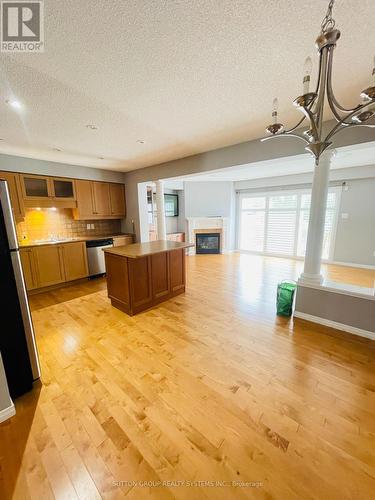 169 Sims Estate Drive, Kitchener, ON - Indoor Photo Showing Kitchen With Fireplace