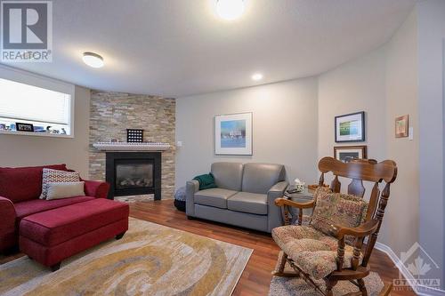 510 Woodchase Street, Ottawa, ON - Indoor Photo Showing Living Room With Fireplace