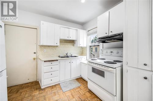 122 Mcewan Street, Windsor, ON - Indoor Photo Showing Kitchen With Double Sink