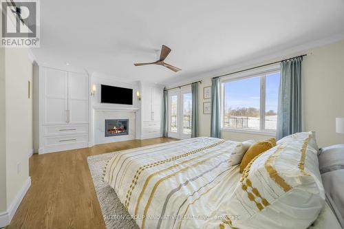 8360 English Church Road, Hamilton, ON - Indoor Photo Showing Bedroom With Fireplace