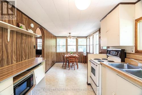 18 Park Road, Tiny, ON - Indoor Photo Showing Kitchen With Double Sink