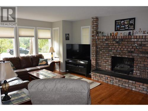 2782 Britton Road, Quesnel, BC - Indoor Photo Showing Living Room With Fireplace