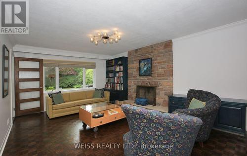 8 Teakwood Grove, Toronto, ON - Indoor Photo Showing Living Room With Fireplace