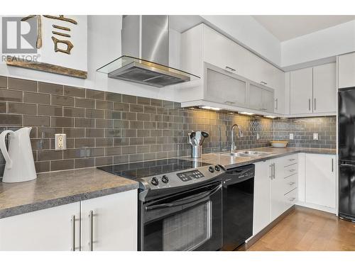 700 Martin Avenue Unit# 307, Kelowna, BC - Indoor Photo Showing Kitchen With Double Sink