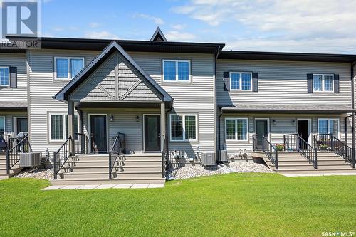 7 4801 Trinity Lane, Regina, SK - Outdoor With Deck Patio Veranda With Facade