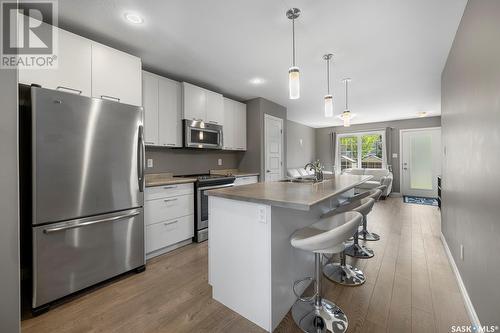 7 4801 Trinity Lane, Regina, SK - Indoor Photo Showing Kitchen With Upgraded Kitchen