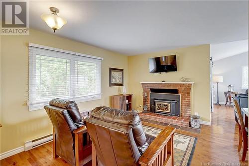 3584 Route 127 Unit# 1, Bayside, NB - Indoor Photo Showing Living Room With Fireplace