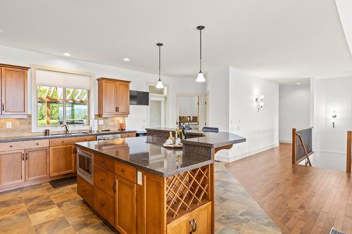 3200 Vineyard View Drive, West Kelowna, BC - Indoor Photo Showing Dining Room With Fireplace