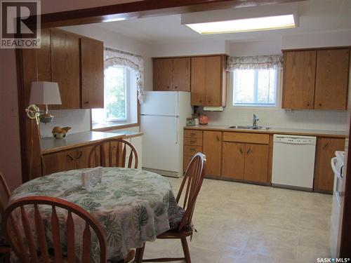 122 1St Street W, Leoville, SK - Indoor Photo Showing Kitchen With Double Sink