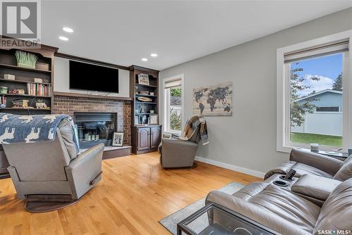 338 Bentham Crescent, Saskatoon, SK - Indoor Photo Showing Living Room With Fireplace