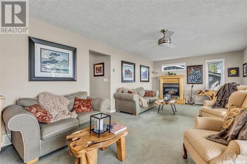 2 Jackfish Lake Crescent, Days Beach, Jackfish Lake, SK - Indoor Photo Showing Living Room With Fireplace