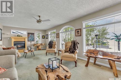 2 Jackfish Lake Crescent, Days Beach, Jackfish Lake, SK - Indoor Photo Showing Living Room With Fireplace