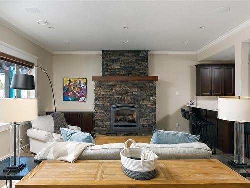 5330 Ptarmigan Street, Kelowna, BC - Indoor Photo Showing Living Room With Fireplace