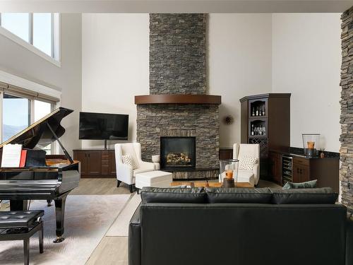 5330 Ptarmigan Street, Kelowna, BC - Indoor Photo Showing Living Room With Fireplace