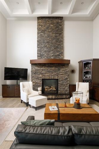 5330 Ptarmigan Street, Kelowna, BC - Indoor Photo Showing Living Room With Fireplace