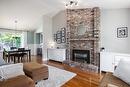 480 Curlew Drive, Kelowna, BC  - Indoor Photo Showing Living Room With Fireplace 