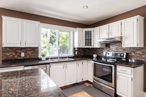 480 Curlew Drive, Kelowna, BC - Indoor Photo Showing Kitchen With Double Sink