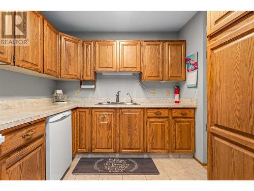 489 Highway 33 W Unit# 301, Kelowna, BC - Indoor Photo Showing Kitchen With Double Sink