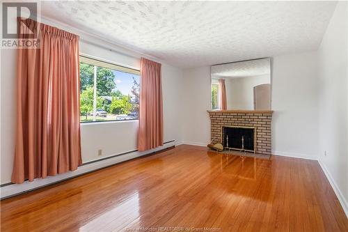 93 Mount Royal, Moncton, NB - Indoor Photo Showing Living Room With Fireplace