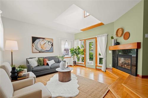 702 Oxford Street, Winnipeg, MB - Indoor Photo Showing Living Room With Fireplace