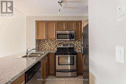 209 - 18 Harding Boulevard, Richmond Hill, ON - Indoor Photo Showing Kitchen With Stainless Steel Kitchen With Double Sink