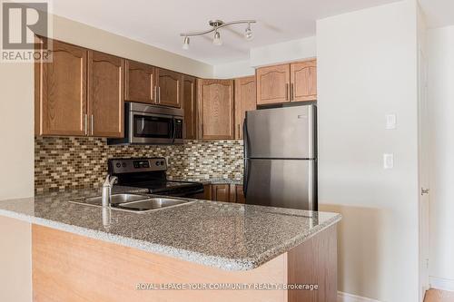 209 - 18 Harding Boulevard, Richmond Hill, ON - Indoor Photo Showing Kitchen With Stainless Steel Kitchen With Double Sink