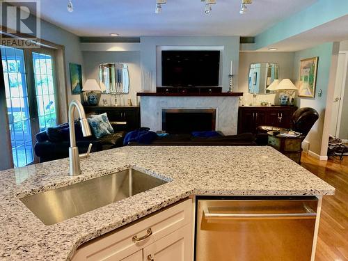 28 Coal Creek Road, Fernie, BC - Indoor Photo Showing Kitchen With Fireplace