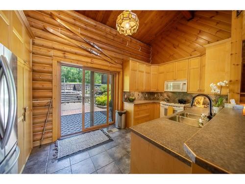 6275 Tie Lake Shore Road N, Jaffray, BC - Indoor Photo Showing Kitchen With Double Sink