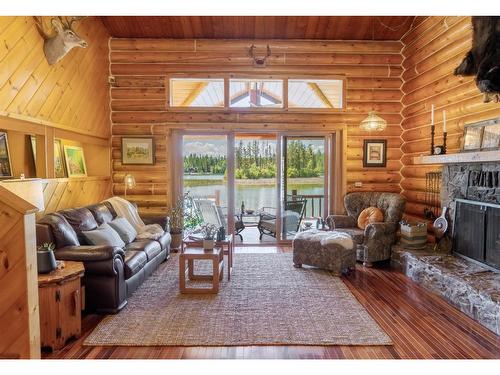 6275 Tie Lake Shore Road N, Jaffray, BC - Indoor Photo Showing Living Room With Fireplace