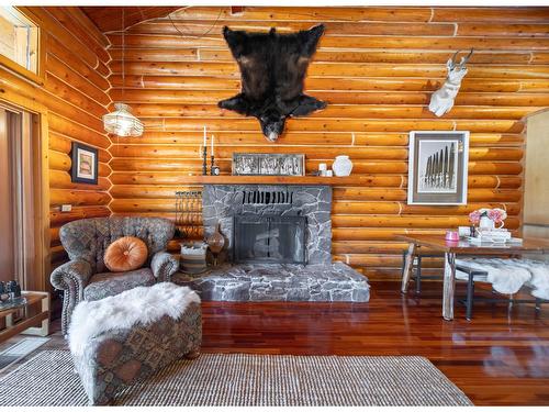 6275 Tie Lake Shore Road N, Jaffray, BC - Indoor Photo Showing Living Room With Fireplace