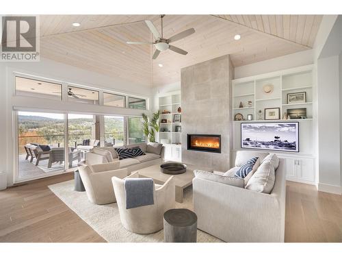 689 Birdie Lake Place, Vernon, BC - Indoor Photo Showing Living Room With Fireplace