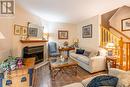 9 - 2915 Headon Forest Drive, Burlington, ON  - Indoor Photo Showing Living Room With Fireplace 