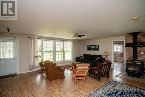 744 Homestead Road, Mattawa, ON - Indoor Photo Showing Living Room With Fireplace