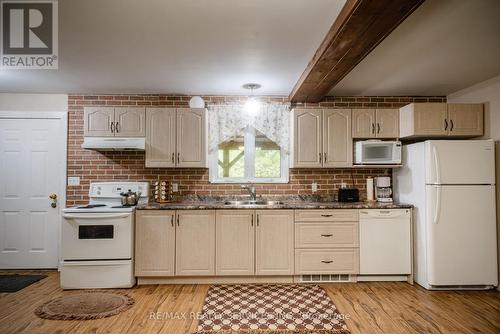744 Homestead Road, Mattawa, ON - Indoor Photo Showing Kitchen With Double Sink