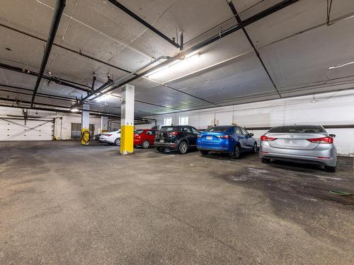 Garage - 309-9910 Boul. Gouin E., Montréal (Rivière-Des-Prairies/Pointe-Aux-Trembles), QC - Indoor Photo Showing Garage