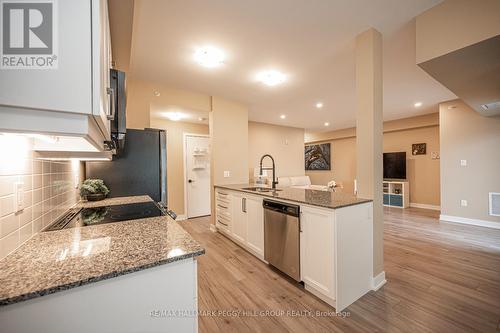 617 - 4 Spice Way, Barrie, ON - Indoor Photo Showing Kitchen With Stainless Steel Kitchen With Upgraded Kitchen