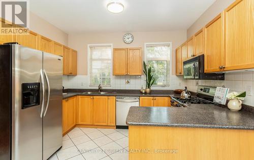 3826 Thomas Street, Mississauga, ON - Indoor Photo Showing Kitchen With Double Sink