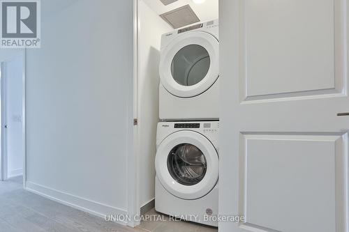 1104 - 1063 Douglas Mccurdy Comm Circle, Mississauga, ON - Indoor Photo Showing Laundry Room