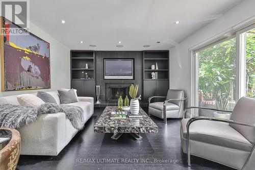 32 Apollo Drive, Toronto (Banbury-Don Mills), ON - Indoor Photo Showing Living Room With Fireplace