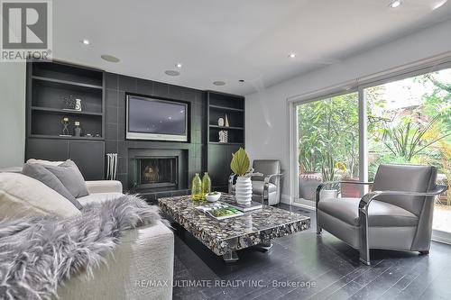 32 Apollo Drive, Toronto (Banbury-Don Mills), ON - Indoor Photo Showing Living Room With Fireplace