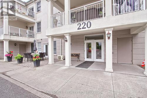 205 - 220 Main Street N, Uxbridge, ON - Outdoor With Balcony With Facade