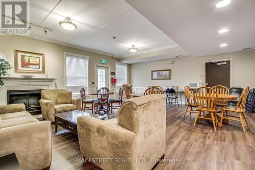 205 - 220 Main Street N, Uxbridge, ON - Indoor With Fireplace